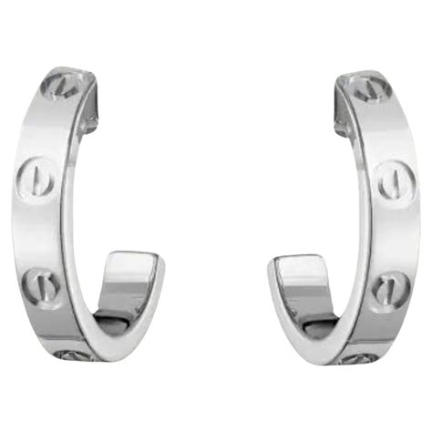 cartier white gold love earrings|cartier love earrings full diamond.